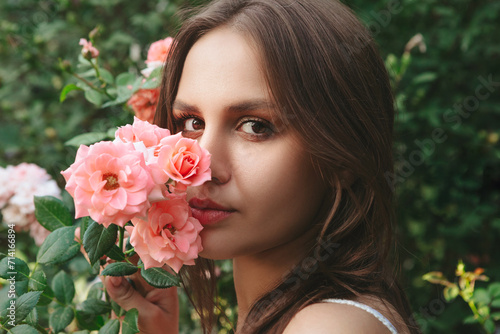 Woman in roses garden