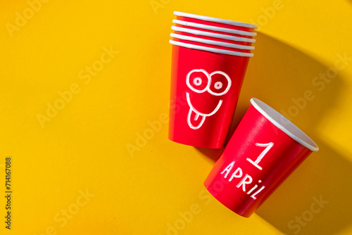 April Fools' Day celebrated on April 1 concept, background with Paper cup for prank photo
