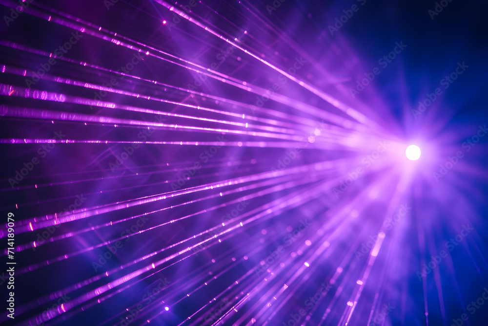 Blue and violet beams of bright laser light shining background Blue and violet beams of bright laser light shining background