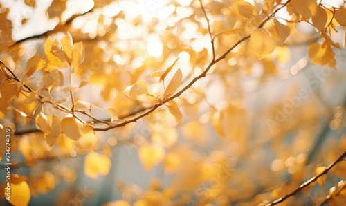 Golden autumn leaves on a sunlit tree branch. Generative AI.