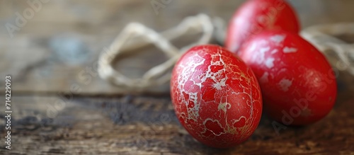 Orthodox Greek tradition of cracked red Easter eggs symbolizes Christ's resurrection.