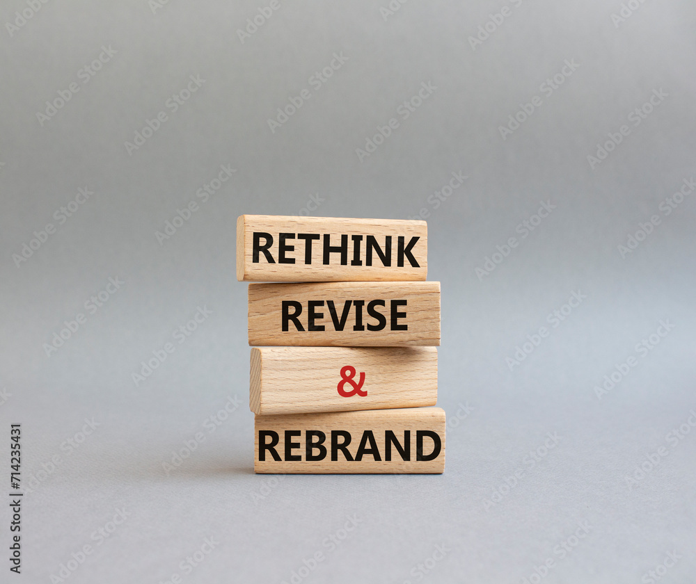 Rethink Revise and Rebrand symbol. Wooden blocks with words Rethink Revise and Rebrand. Beautiful grey background. Business and Rethink Revise and Rebrand concept. Copy space. Rethink Revise and Rebrand symbol. Wooden blocks with words Rethink Revise and Rebrand. Beautiful grey background. Business and Rethink Revise and Rebrand concept. Copy space.