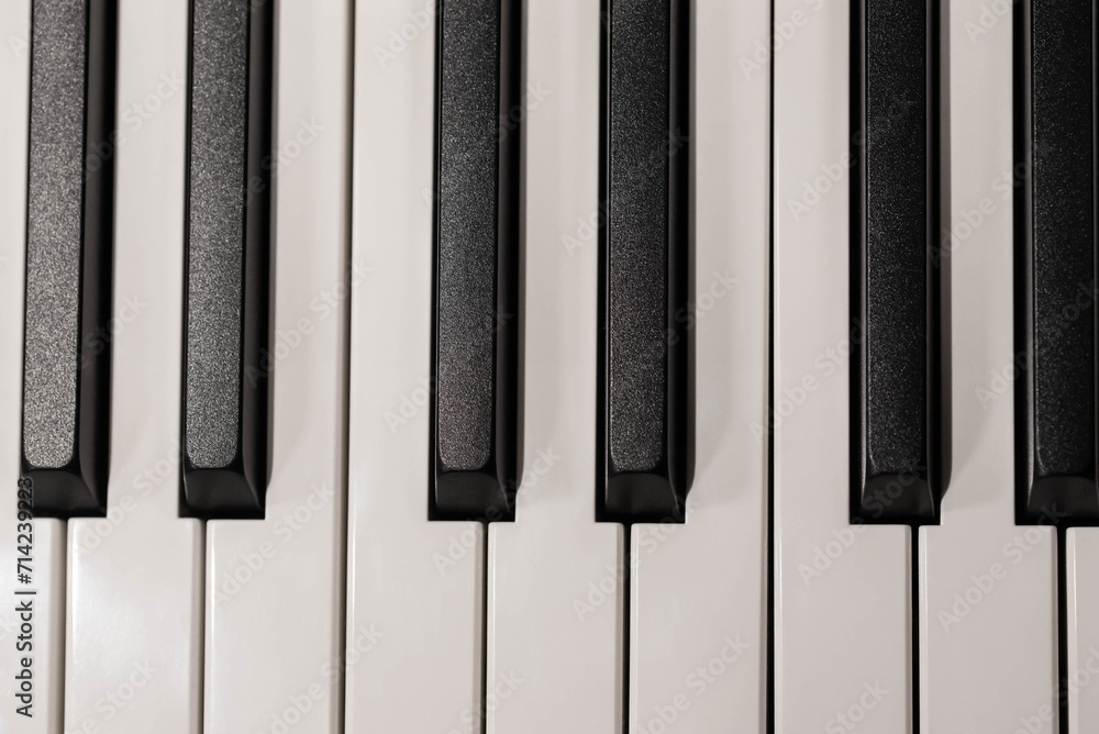 Naklejka premium Classic Piano Keys, Traditional Black and White Keyboard Close up Flat Lay
