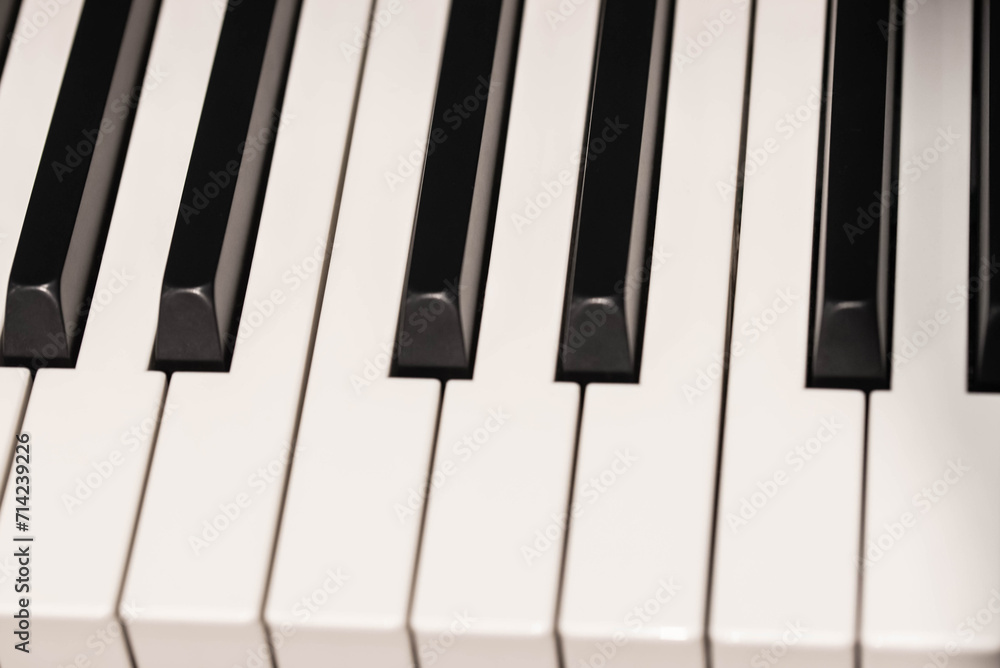 Classic Piano Keys, Traditional Black and White Keyboard Close up with selective focus Classic Piano Keys, Traditional Black and White Keyboard Close up with selective focus