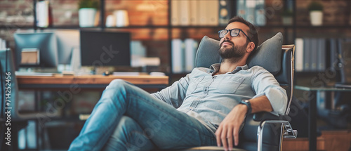 Young Business Professional Taking a Moment of Relaxation in a Modern Office Environment