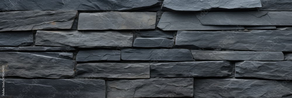 Fototapeta premium Slate stone wall pattern panoramic banner background