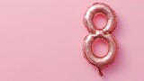 Celebration for International Women's Day. Number 8 Shaped Balloon on a Pastel Pink Background.