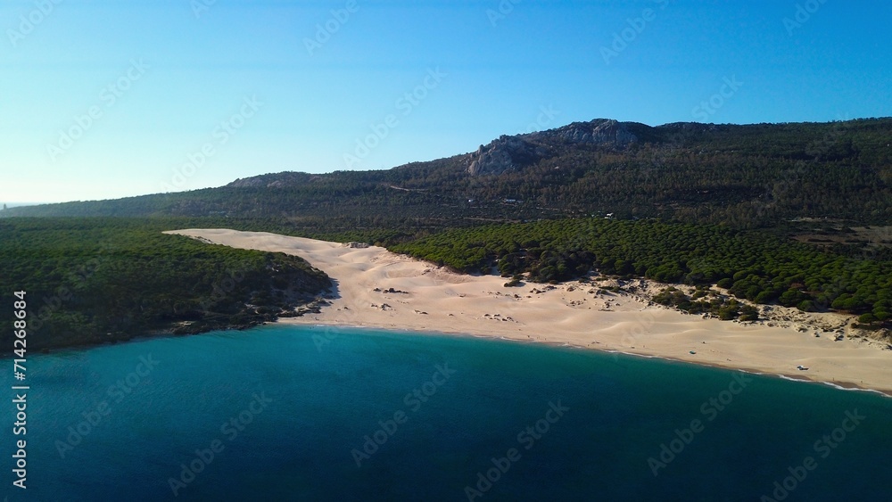 aerial view of the beautiful beach and high sand dune of Bolonia at the Costa de la Luz, Andalusia, Cadiz, Spain