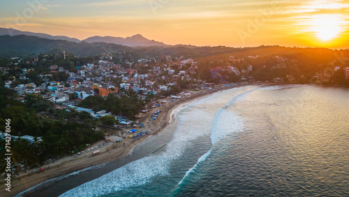 Aerial of riviera Nayarit in Mexico Pacific Ocean surf spot at sunset  photo
