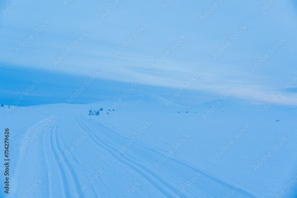 The blue hour in the Norwegian winter mountain landscape