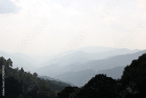 Misty Mountains Morning View with Clouds and Fog