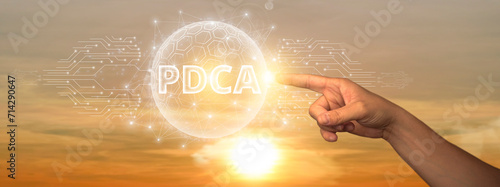 PDCA: Man Touching Global Network and Data Connection on Space Background. Plan, Do, Check, Act - Continuous Improvement, Iterative Process, Strategic Cycle. photo