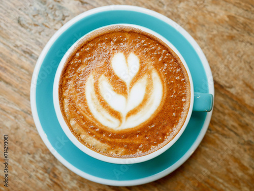 A cup of coffee latte art with steamed milk