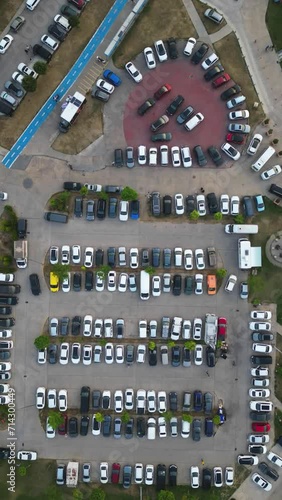 Wallpaper Mural A busy parking lot in rush hour. Different types and colored vehicles parking in timelapse. Torontodigital.ca