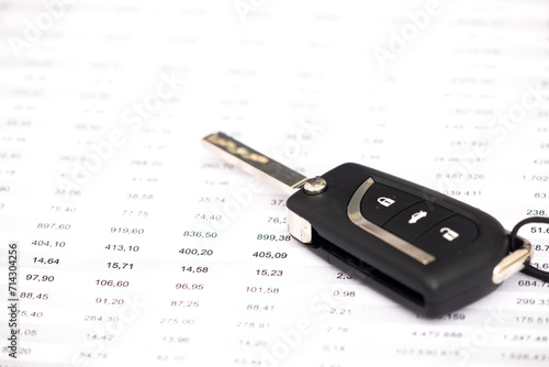 Modern car flip key isolated on white with graph