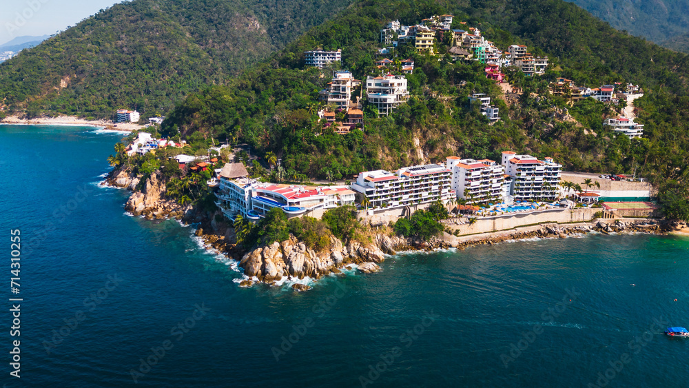 Aerial of Mismaloya beach resort waterfront town in Nayarit coastline riviera close to Puerto Vallarta surf spot holiday destination