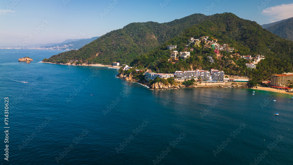 Naklejka premium Aerial of Mismaloya beach resort waterfront town in Nayarit coastline riviera close to Puerto Vallarta surf spot holiday destination