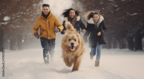 a family runs through snow with a dog