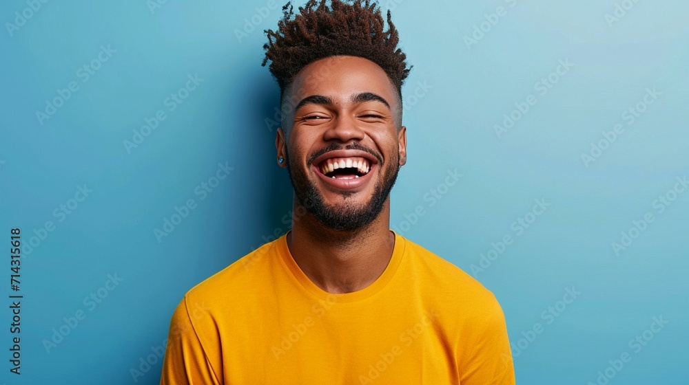 Obraz premium Playful young man making funny faces and spreading joy with his lighthearted expressions. [Playful man making funny faces