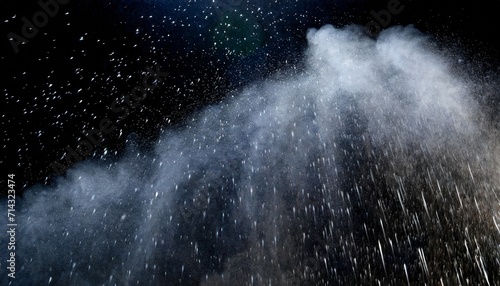 million of star dust photo image of falling down shower rain snow heavy snows storm flying freeze shot on black background overlay spray water fog smoke as star particle on wind photo
