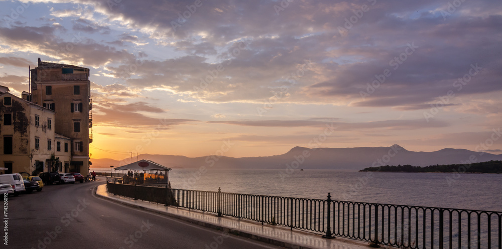 Beautiful view of Corfu town ,Greece during sunset with mountains visible in ac background