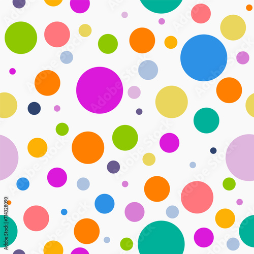 Colorful polka dots of different sizes on white background. Vector