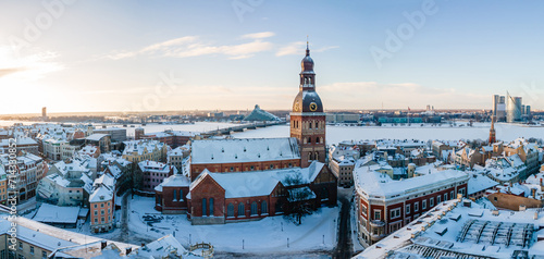 Aerial panorama view of Riga old town during beautiful winter day in Latvia. Freezing temperature in Latvia. White Riga.