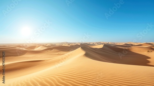  the sun shines brightly over a vast expanse of sand dunes in the middle of the desert, in the middle of the desert, is a bright blue sky.