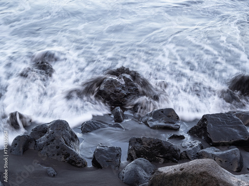 beach with black volcanic sand on  Tenerife photo