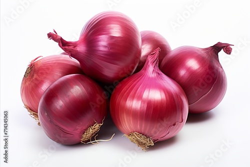 Assorted organic onions isolated on a clean white background for culinary and agricultural concepts.