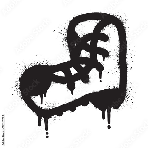 Boot graffiti drawn with black spray paint