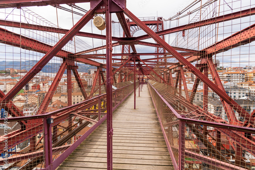 Steel Structure at the top of the Vizcaya Bridge, or Puente Colgante (“Hanging Bridge”) in Portugalete, Spain Steel Structure at the top of the Vizcaya Bridge, or Puente Colgante (“Hanging Bridge”) in Portugalete, Spain