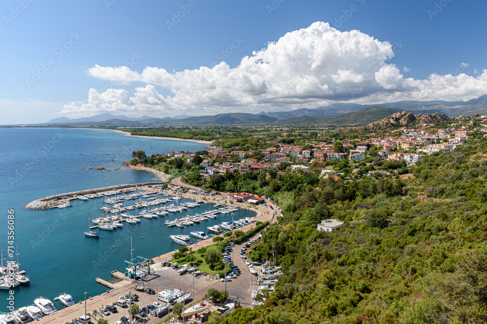 Panoramic summer view Santa Maria Navarrese, small touristic town in east Sardinia, with coastline in the background