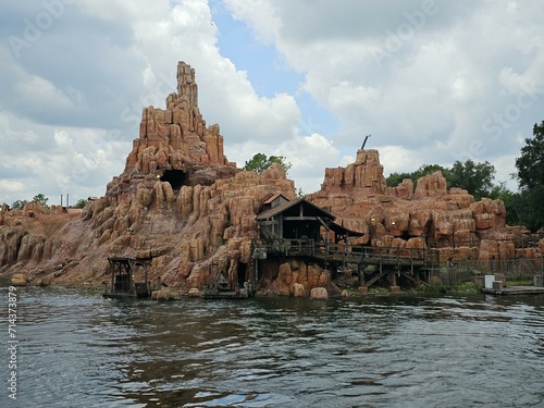 Magic Kingdom Park Big Thunder Mountain Railroad Water Cloud Sky Lake