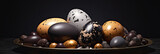 Dark and ambar Easter eggs in a bronze platter with snall eggs decorationon dark background. Black, white, gray and yellow painted eggs banner. Generative AI.