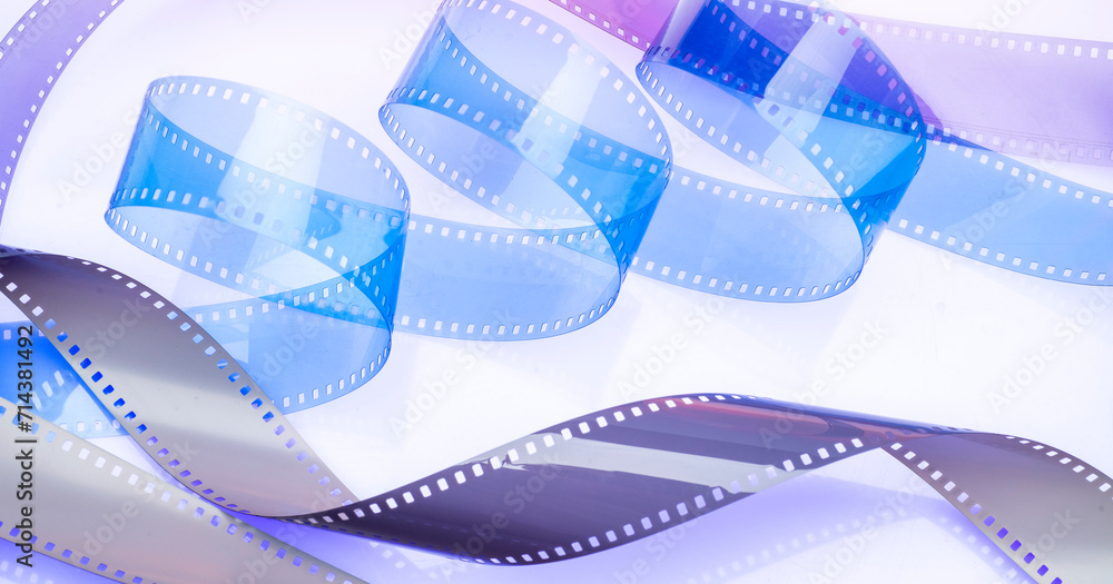 abstract multicolored background with film strip.film festival film production premiere announcement concept