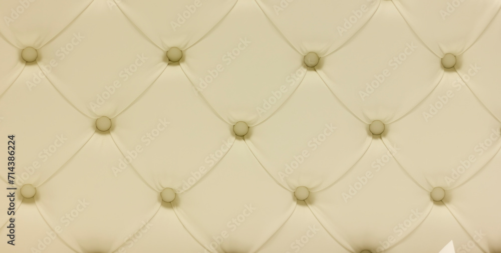 Fototapeta premium the back of a luxury sofa in retro style with buttons and rhombuses