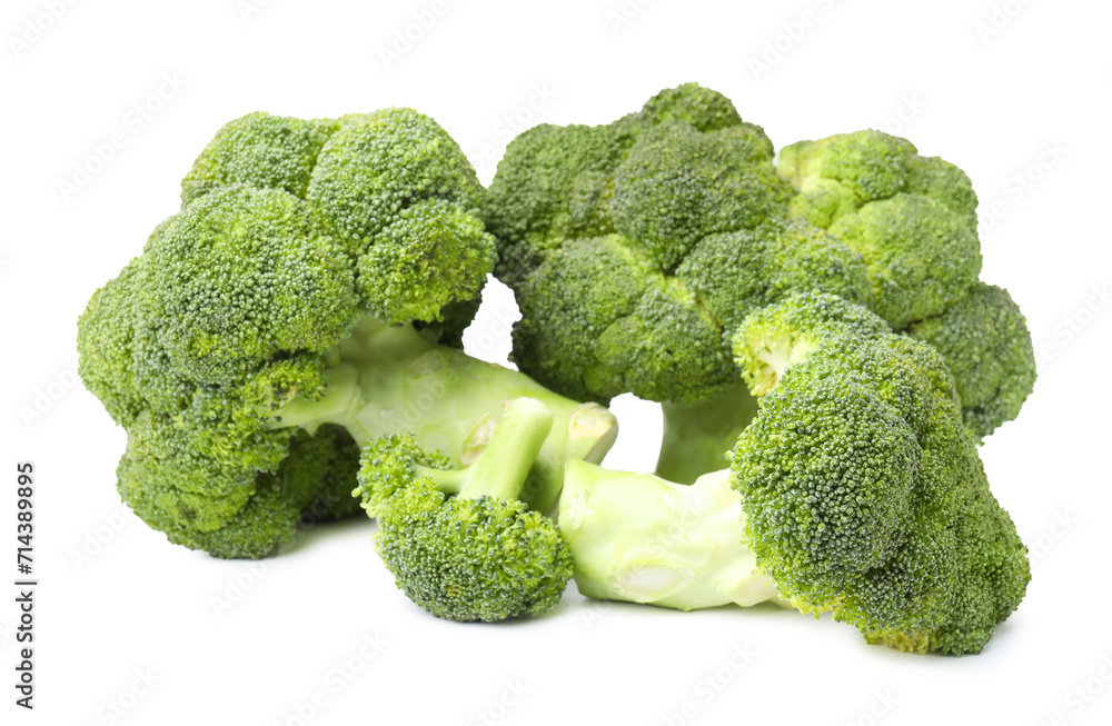 Pile of fresh raw green broccoli isolated on white Pile of fresh raw green broccoli isolated on white
