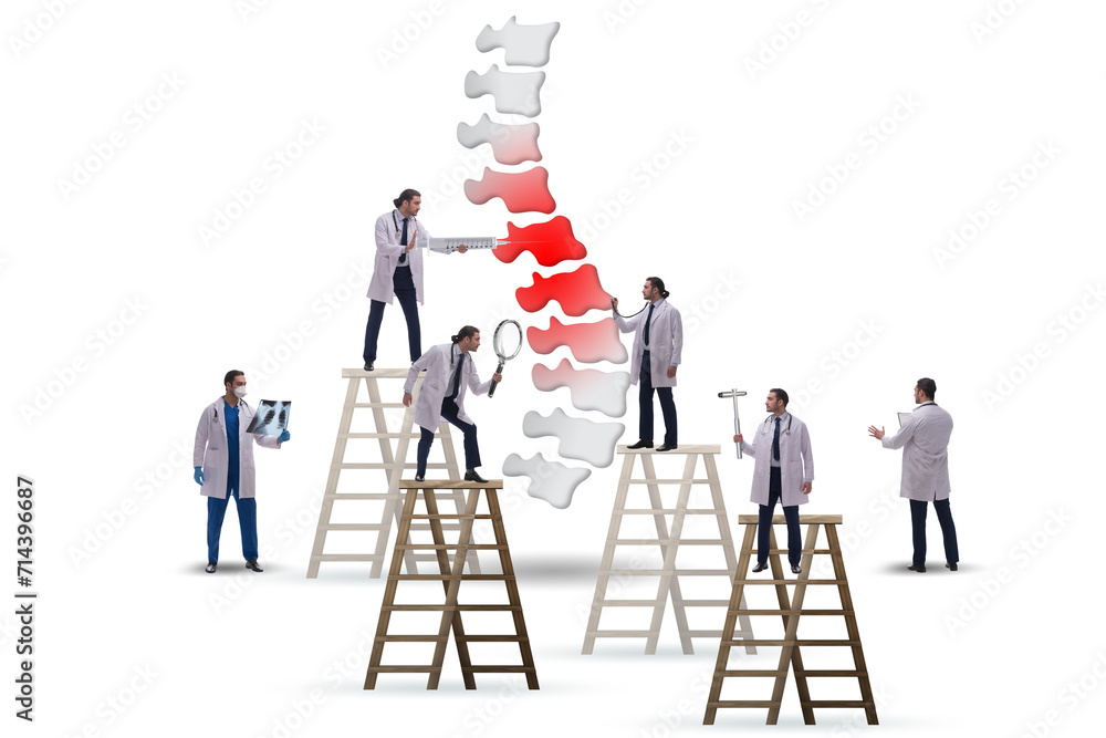 Medical concept with doctors and spine Medical concept with doctors and spine