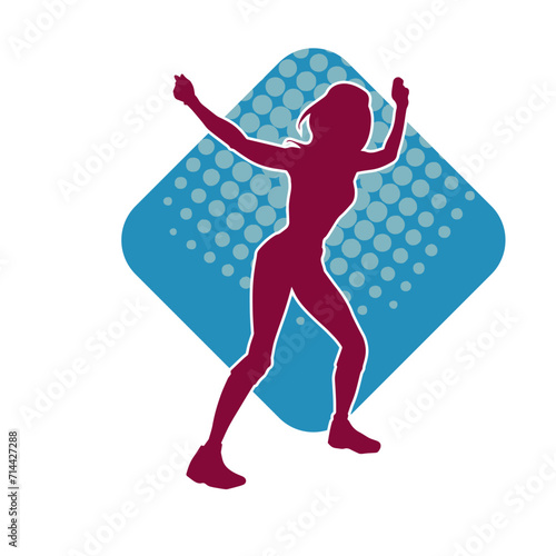 Silhouette of a casual female in a dancing pose. Silhouette of a dancer woman in action pose.