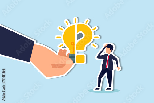 Business problem, idea, decision making and solution, job and career path concept, confusing businessman stand with question mark sign then helping hand put half of lightbulb lamp for bright solution.
