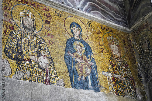 11th century  Byzantine mosaic features Virgin Mary and Infant Jesus between Emperor John Comnenus II and Empress Eirene inside the Hagia Sophia,Istanbul, Turkey photo