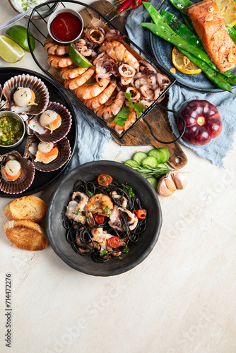 Assortment variousfish dishes - octopus, shrimp, crab, seafood, mussels, salmon.