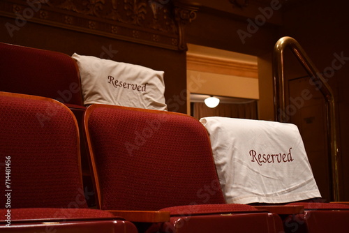 Fotografía Reserved seating covers on theater seats.