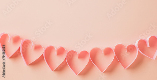 Happy Valentines Day. Flat lay pink ribbon heart shaped on pastel pink background, Festive background with copy space, Valentine's day concept photo