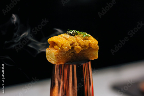 Premium Bafun Uni is on crispy Japanese-style toast. photo