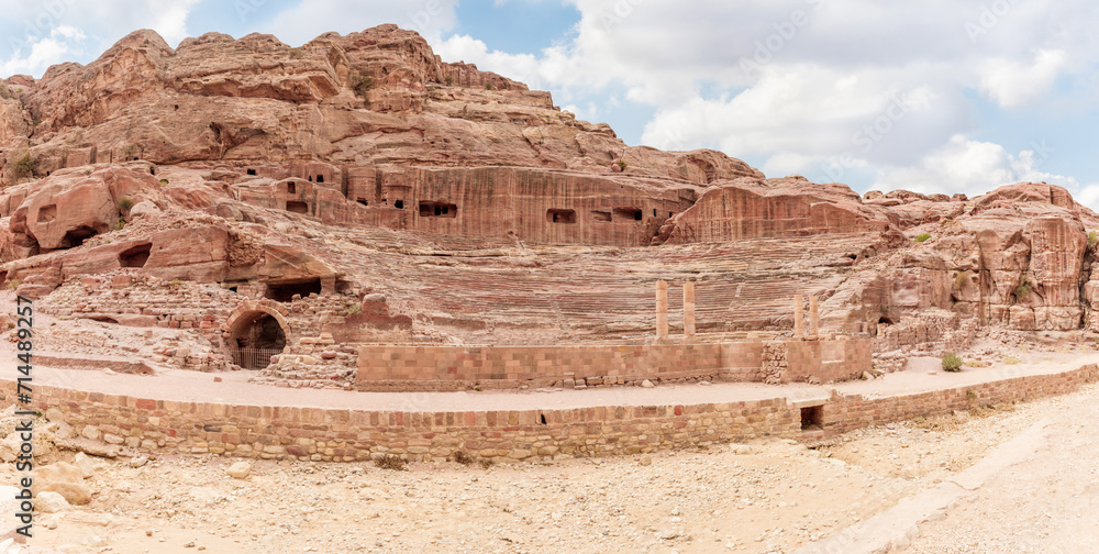 A well preserved amphitheater carved by Nabatean craftsmen into rock in Nabatean Kingdom of Petra in the Wadi Musa city in Jordan