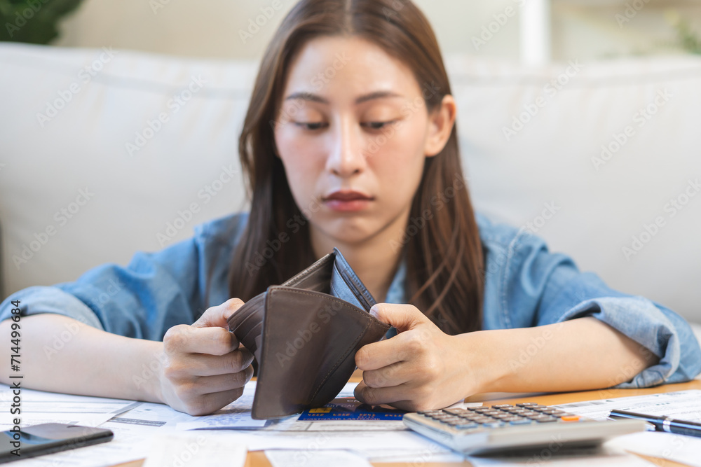 Stressed, Problem business person woman holding and open empty wallet, purse no have money for bill payment, credit card loan or expense. Bankruptcy, bankrupt or debt financial, mortgage concept. Stressed, Problem business person woman holding and open empty wallet, purse no have money for bill payment, credit card loan or expense. Bankruptcy, bankrupt or debt financial, mortgage concept.