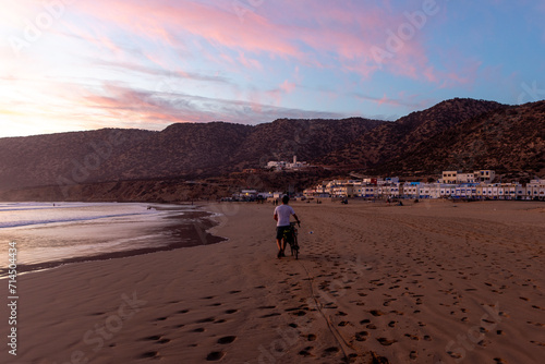 people walking on the beach