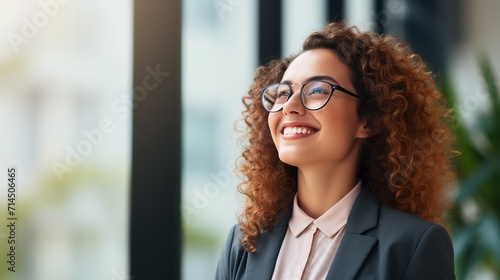 Close up happy young woman with curly hair and glasses ai generated high quality image